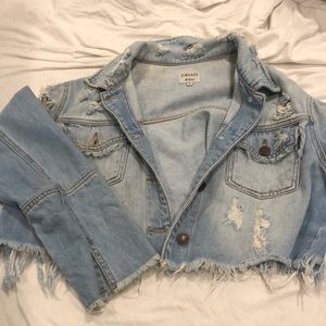 Distressed jean jacket